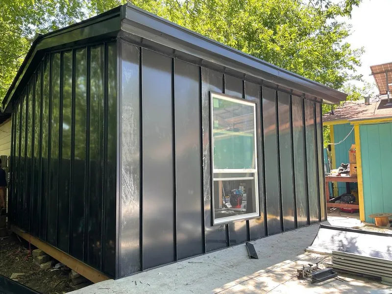 Black standing seam metal wall panels for Metal Roof Installation in South Elgin