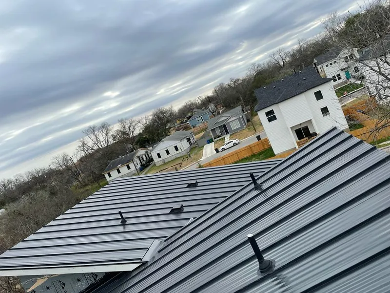 Standing seam metal roof panels with vents for Skylight Repair in South Elgin